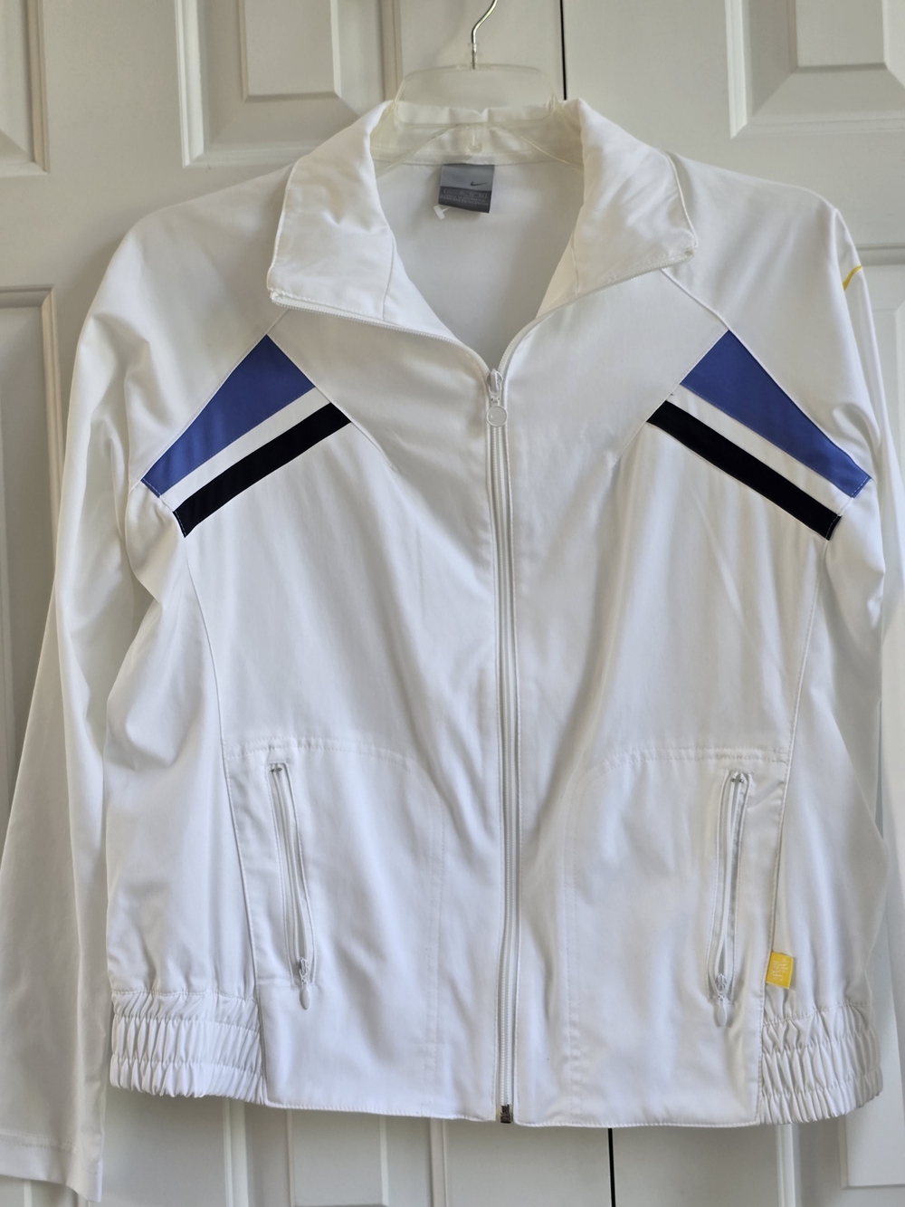 Vintage Nike White Zip-Front Varsity Jacket with Blue and Black Accents